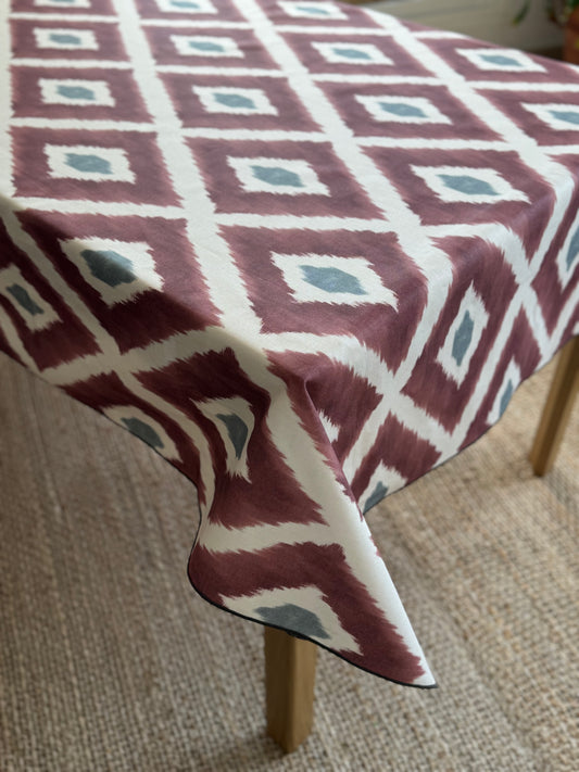 TELA IKAT BURDEOS ALGODÓN